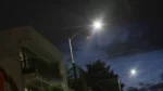 Calle de la ciudad de Puebla con alumbrado público.