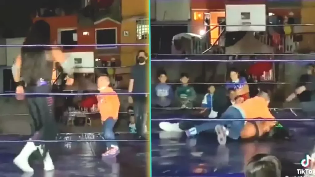 Imagen de un pequeño y un luchador sobre un cuadrilátero.