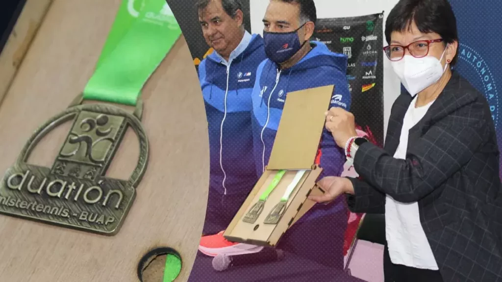 La rectora de la BUAP, Lilia Cedillo presentó la medalla del Duatlón Puebla 2023.