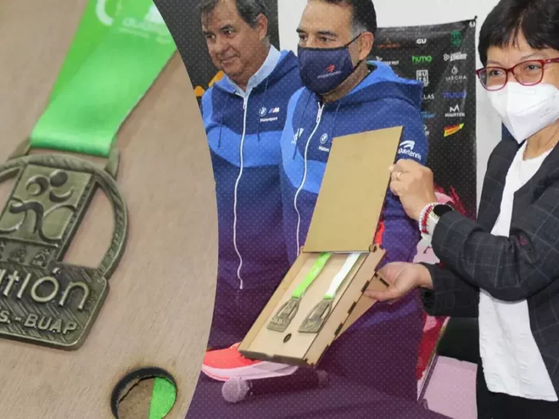 La rectora de la BUAP, Lilia Cedillo presentó la medalla del Duatlón Puebla 2023.