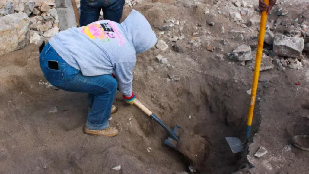 Seguirá búsqueda de restos en fosa clandestina de Palmar de Bravo en Puebla