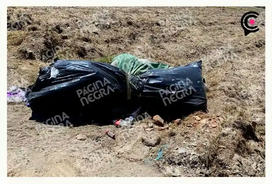 Abandonan cadáver emplayado y embolsado en San Sebastián de Aparicio, Puebla