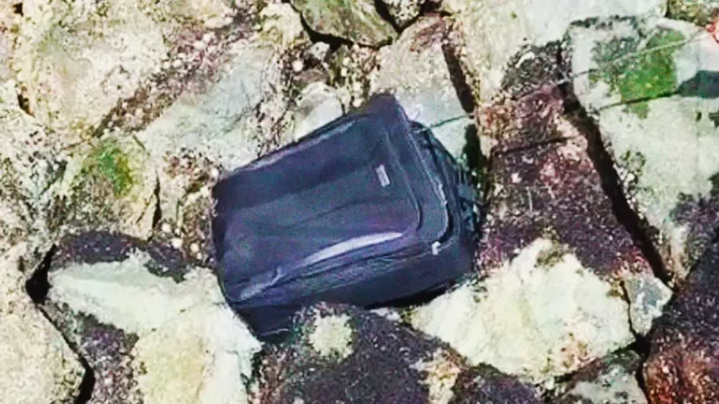 Hallan maleta con un cadáver en San Pablo del Monte