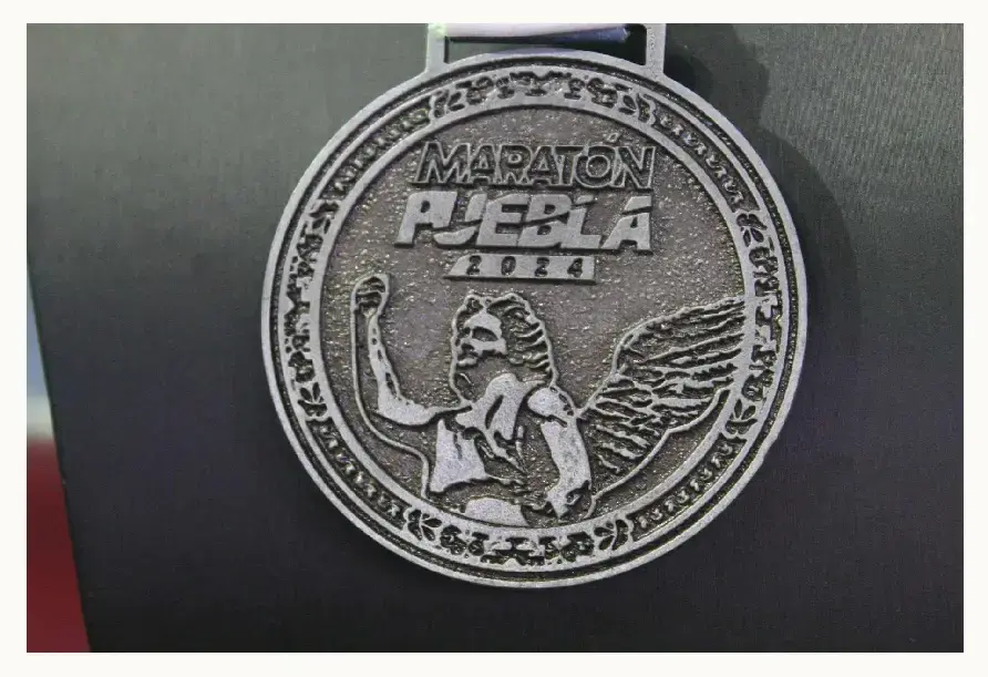 Playera y medalla del Maratón Puebla 2024 están inspiradas en el arte barroco y ángeles