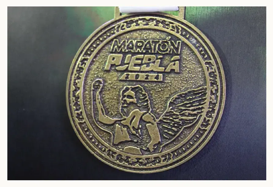 Playera y medalla del Maratón Puebla 2024 están inspiradas en el arte barroco y ángeles