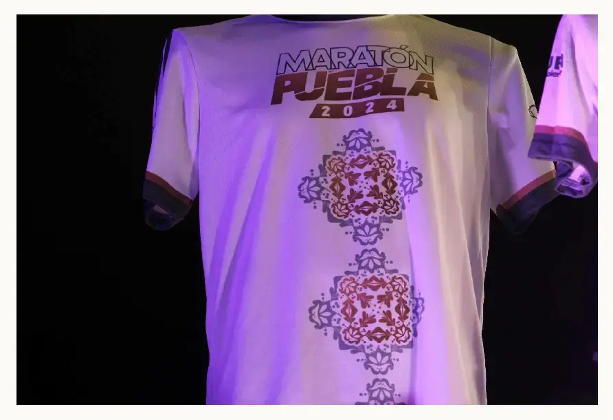 Playera y medalla del Maratón Puebla 2024 están inspiradas en el arte barroco y ángeles