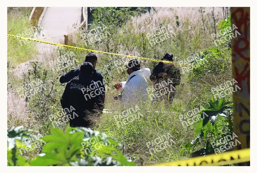 Abandonan cuerpo envuelto en cobijas y embolsado en la autopista México-Puebla