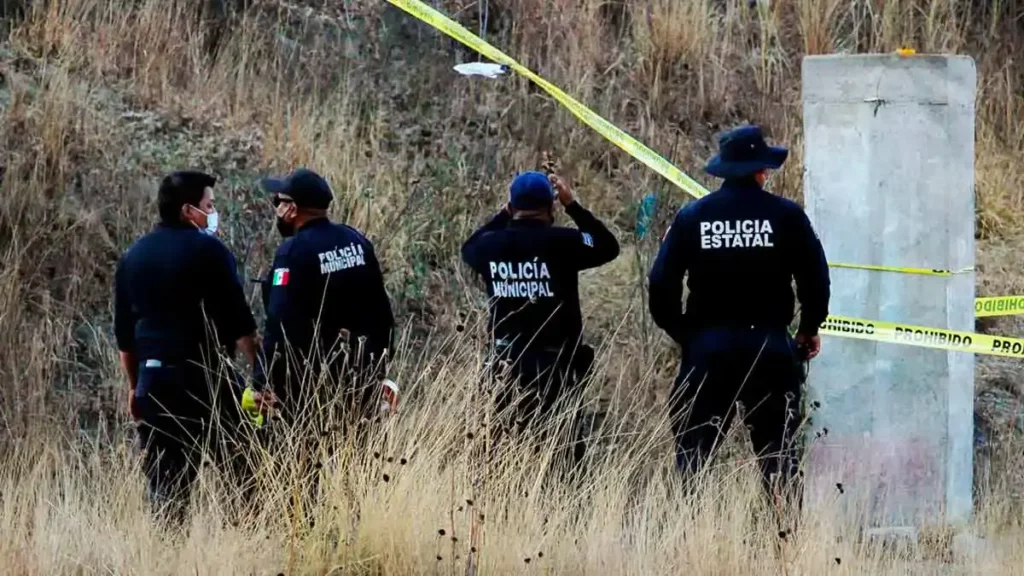 Encuentran restos humanos embolsados en Yahualtepec, Puebla