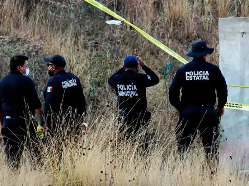 Encuentran restos humanos embolsados en Yahualtepec, Puebla