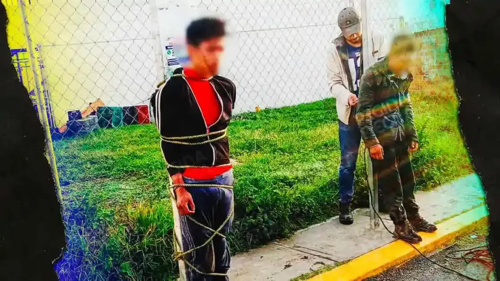 Vecinos de Amozoc detienen y amarran a dos ladrones; policías frustran linchamiento
