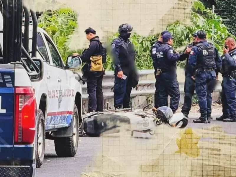 Motociclistas derraparon tras ser baleados en una riña, en la lateral de la autopista México-Puebla