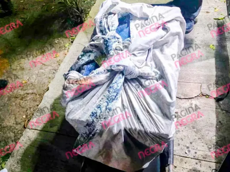 Encuentran el cuerpo de un hombre dentro de maleta en Cuautlancingo, Puebla
