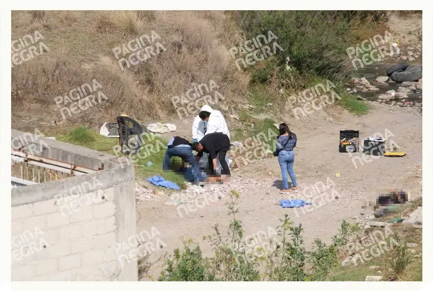 Hallan dos cuerpos ejecutados en barranca de Puebla capital