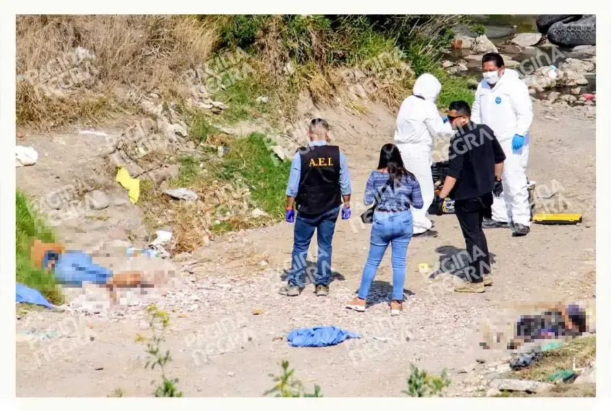 Hallan dos cuerpos ejecutados en barranca de Puebla capital