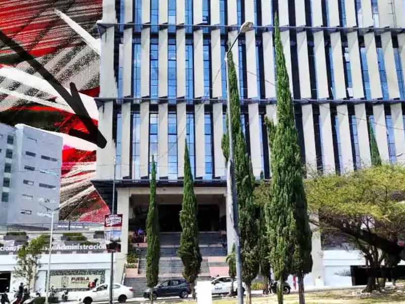 Empleados de Finanzas Puebla sobreviven gracias a ambulantes ante falta de servicios en nueva sede